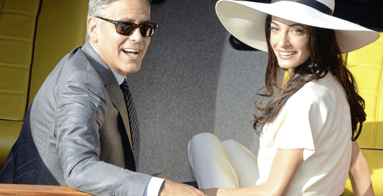 Джордж и Амаль Клуни купили всем в самолете наушники