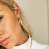 Для взрослых only: стильный пирсинг в ушах в черном и золотом цветах