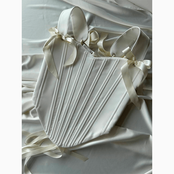 Кожа, цветные сумки, банты и еще 5 классных трендов весны-2026