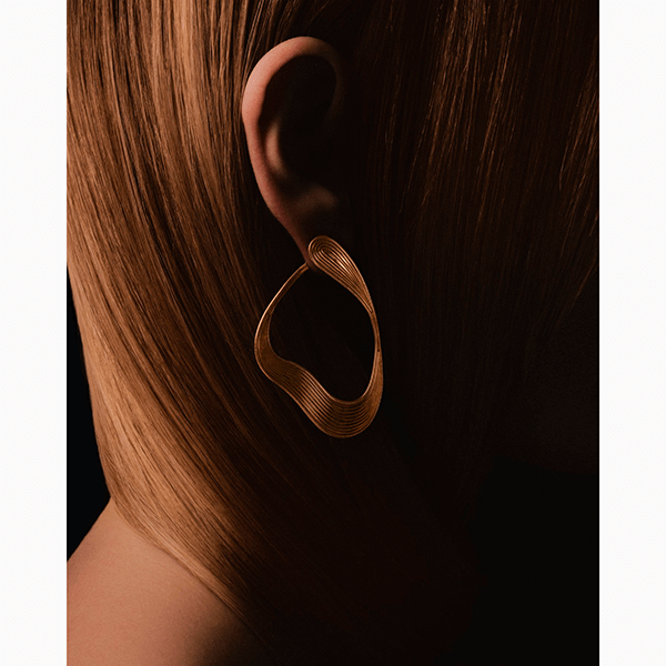 Серьги текучих, плавных форм – настоящий хит 2026 года